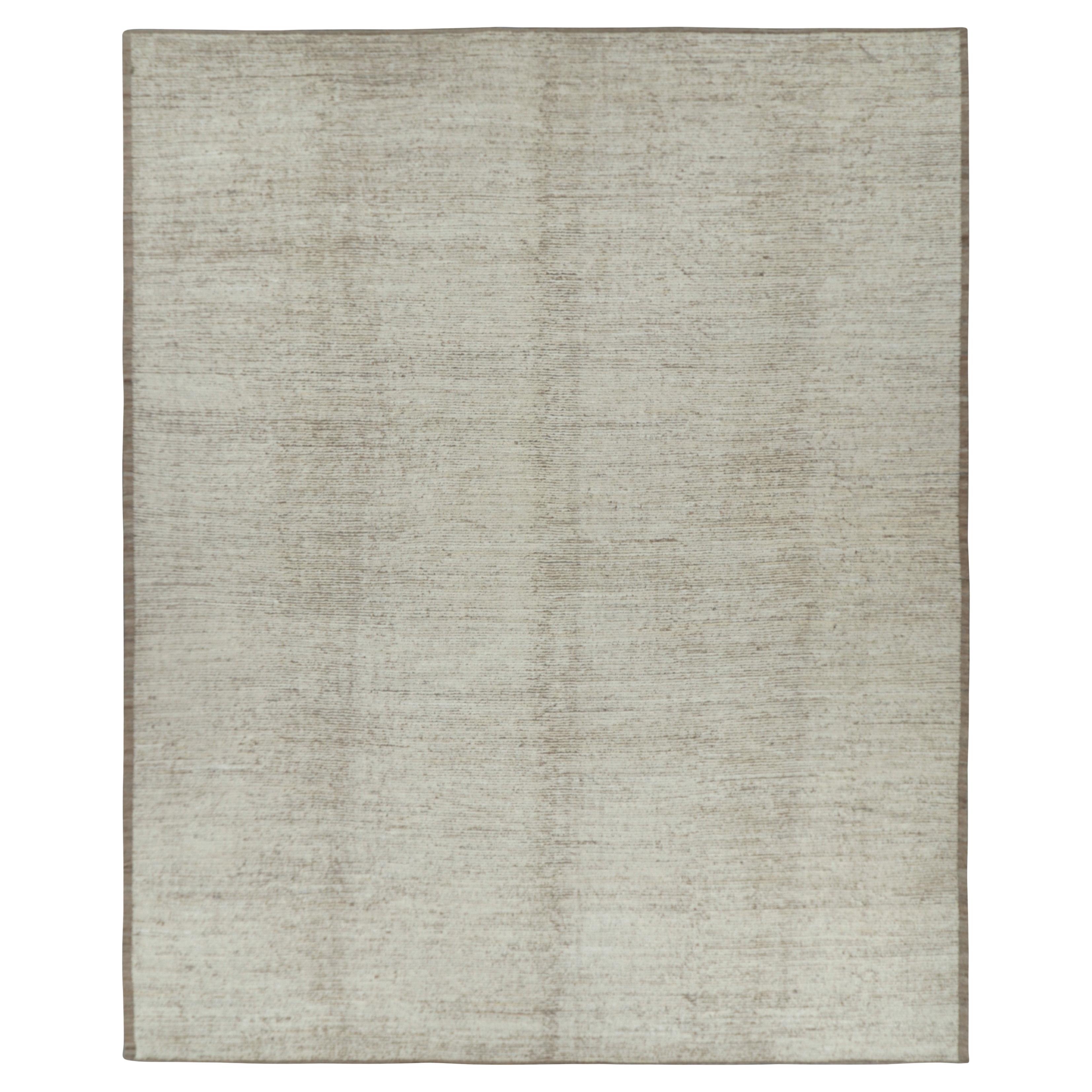 Rug 
Kilim è un kilim sovradimensionato con strisce e striature testuali beige e bianche. in vendita
