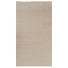 Rug 
Kilim’s Oversized Modern Textural Rug in Beige and Cream Striae