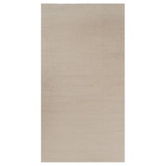 Rug 
Kilim’s Oversized Modern Textural Rug in Beige and Cream Striae