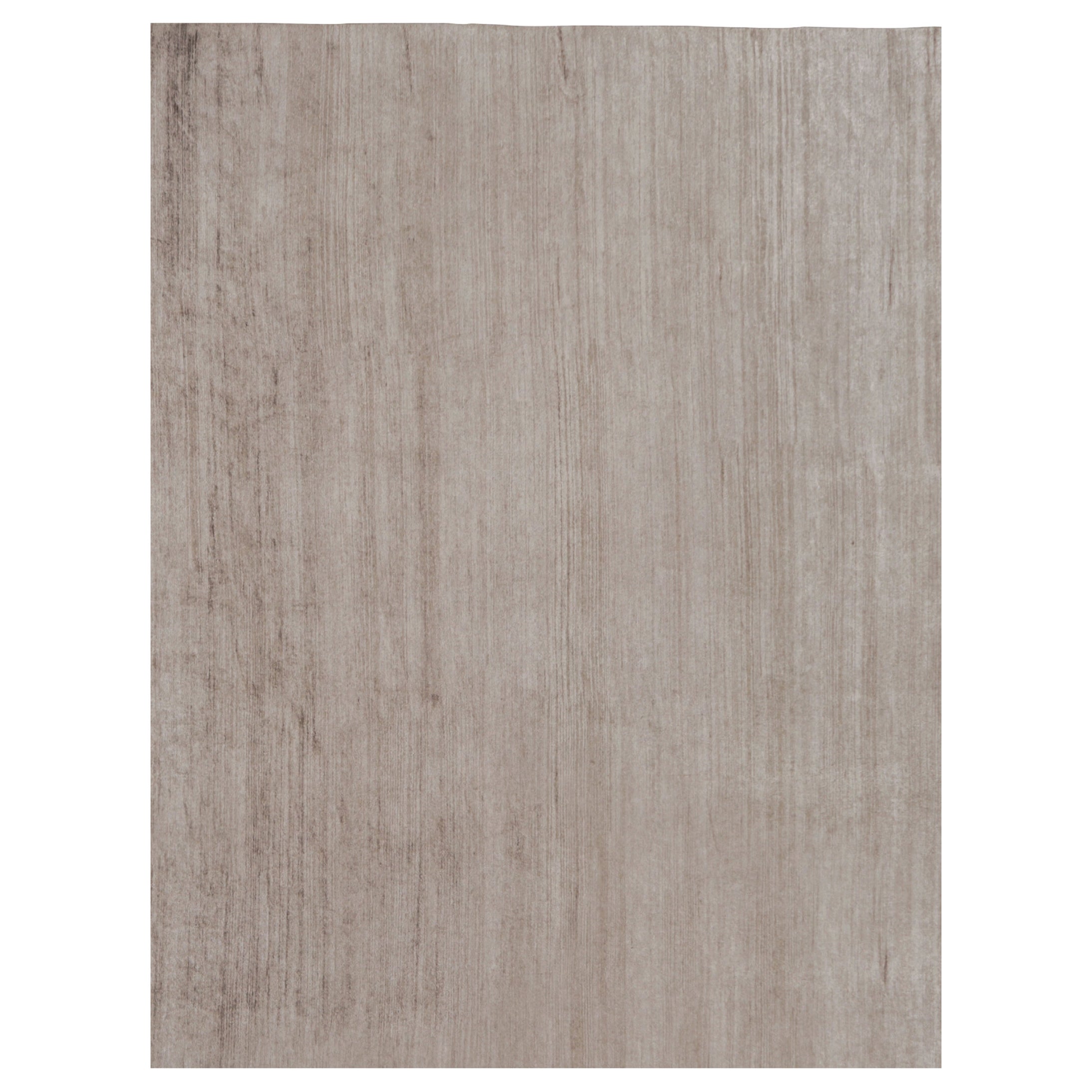 Rug 
Kilim è un tappeto moderno sovradimensionato a righe marroni, bianche e beige.