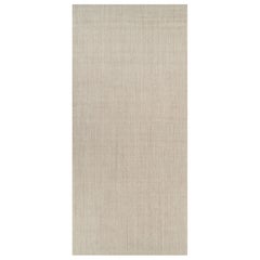 Rug 
Kilim’s Oversized Modern Textural Solid Rug in Beige Tones and Striae