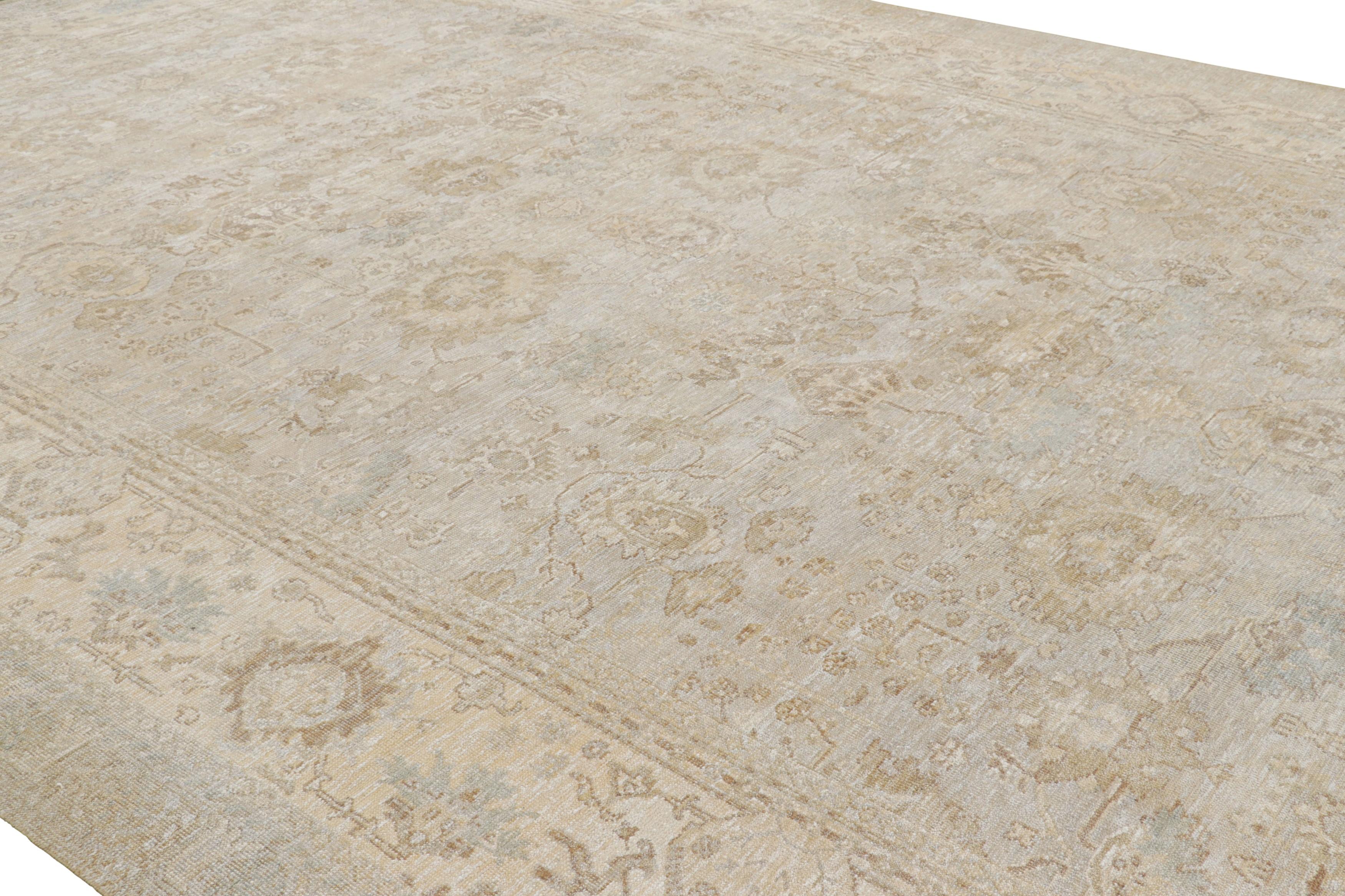 Made with hand-knotted wool and silk, this modern 13x19 oversized rug represents a regal new line in Rug & Kilim’s Modern Classics Collection—inspired by vintage and antique Oushak rug designs.

On the Design: 

A field with cream, ivory white and