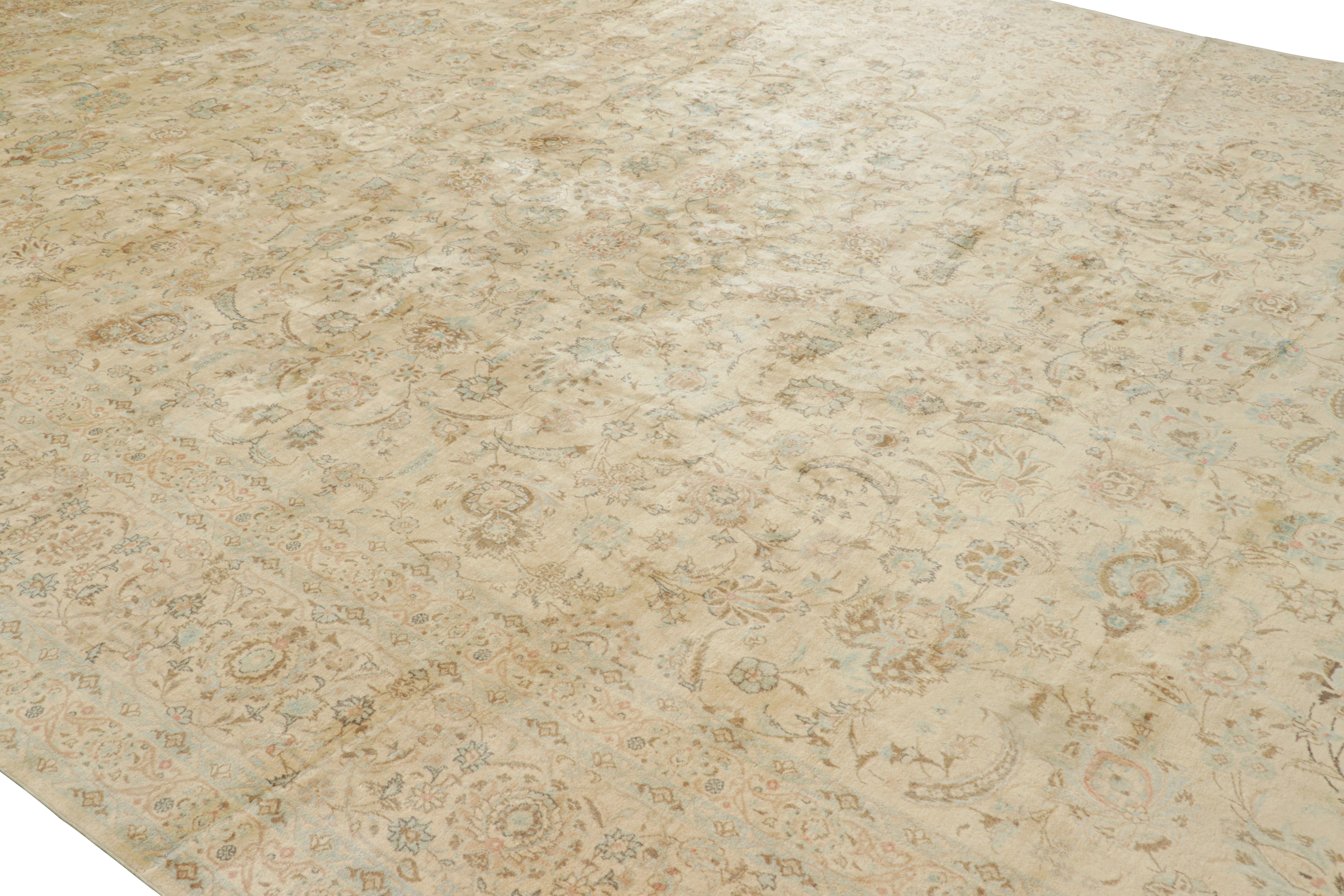Hand-knotted in wool, this 12x19 contemporary rug from our Modern Classics collection is particularly inspired by vintage and antique Kashan 
Rug designs. 

On the Design: 

Keen eyes will admire creamy white hues underscoring floral patterns in