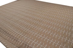 Rug & Kilim’s Oversized Scandinavian Style Rug in Beige-Brown and Floral Pattern