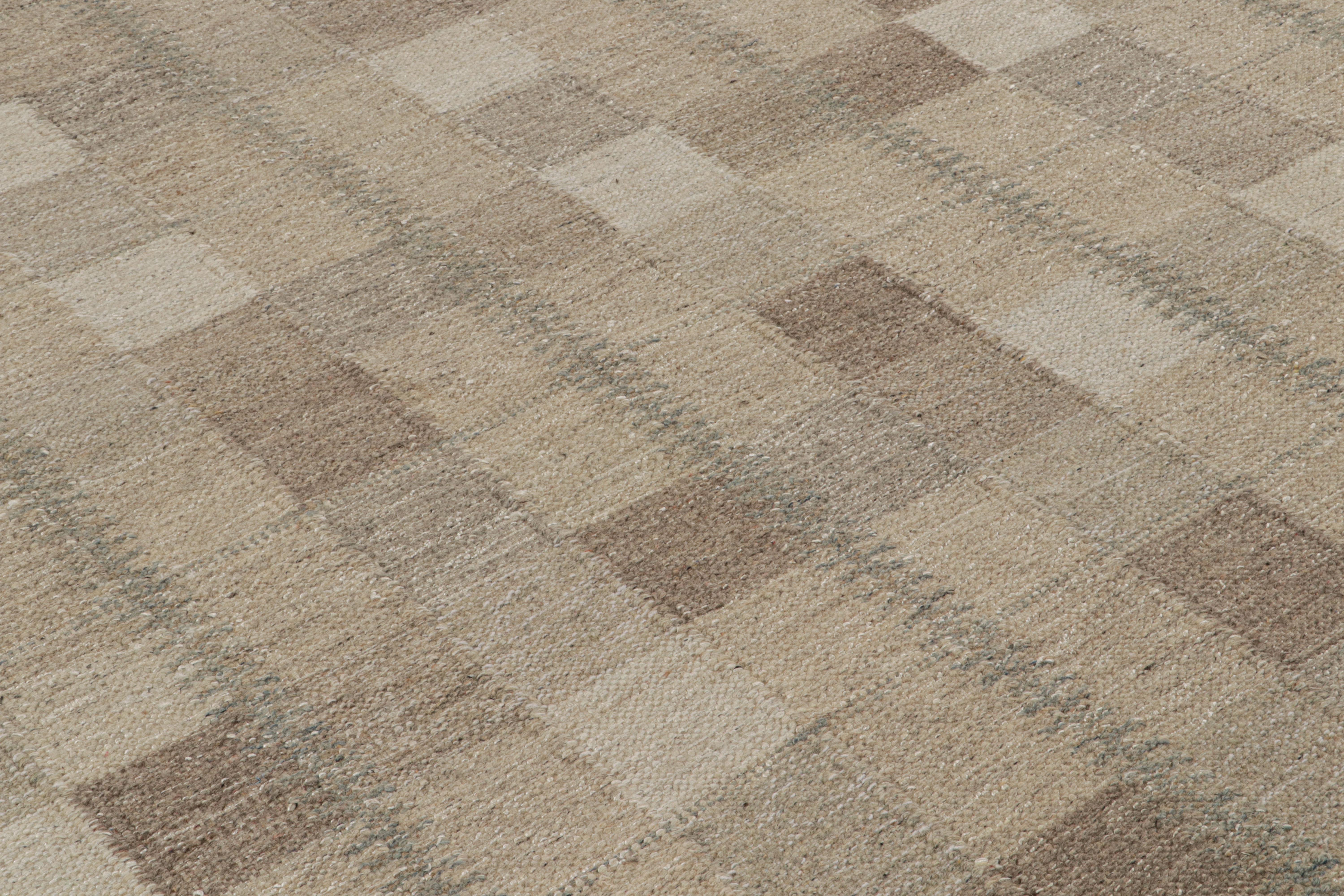 Hand-knotted in wool, this 18x31 Scandinavian palace rug features beige-brown and taupe tones in geometric patterns, namely a grid of squares and stripes inspired by the Swedish minimalist and deco sensibilities of this aesthetic. 

On the design:
