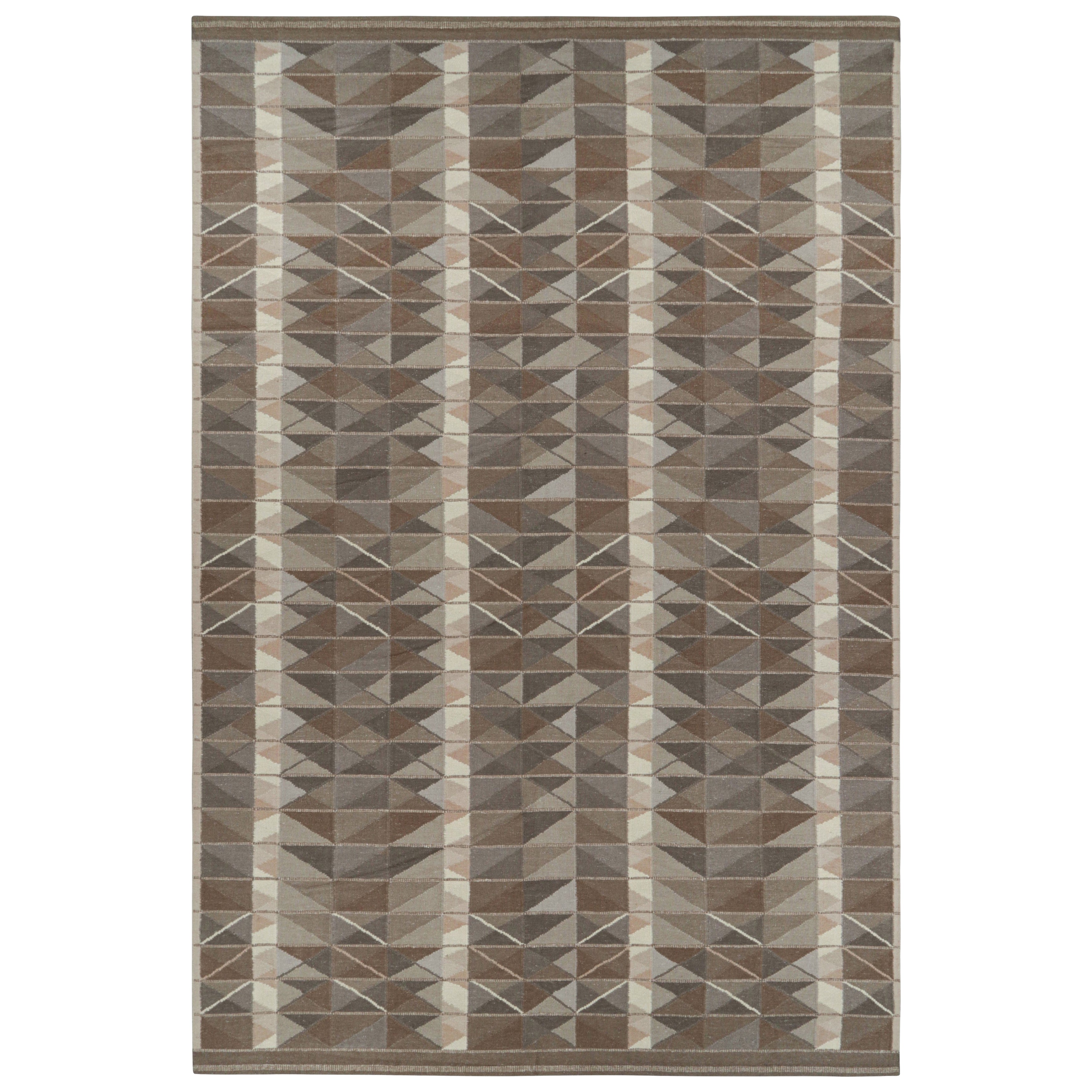 Rug
Kilim
s übergroßer Teppich im skandinavischen Stil in Beige-Braun mit geometrischen Mustern