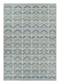 Rug & Kilim’s Oversized Scandinavian Style Rug in Blue with Geometric Patterns