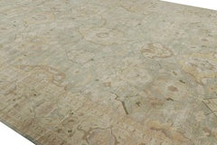 Rug & Kilim’s Oversized Shield Rug in Pale Green with Floral Medallions