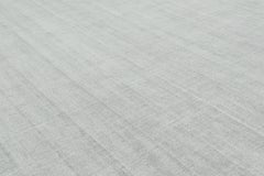 Rug & Kilim’s Oversized Textural Rug in Light Gray and Blue Tones & Striae