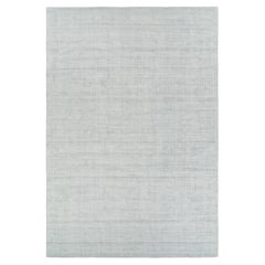 Rug & Kilim’s Oversized Textural Rug in Light Gray and Blue Tones & Striae