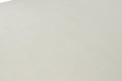 Rug & Kilim’s Oversized Textural Rug in Simple, Solid Cream White Tones