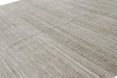 Rug & Kilim’s Oversized Textural Rug In Solid Beige and Taupe Tones Striae