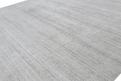 Rug & Kilim’s Oversized Textural Rug In Solid Gray and Off-White Striae