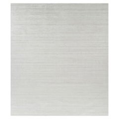 Rug & Kilim’s Oversized Textural Rug In Solid White, Gray and Cream Striae