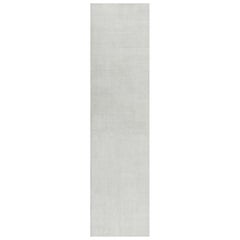 Tapis texturé surdimensionné de Rug & Kilim dans des tons blancs et des rayures