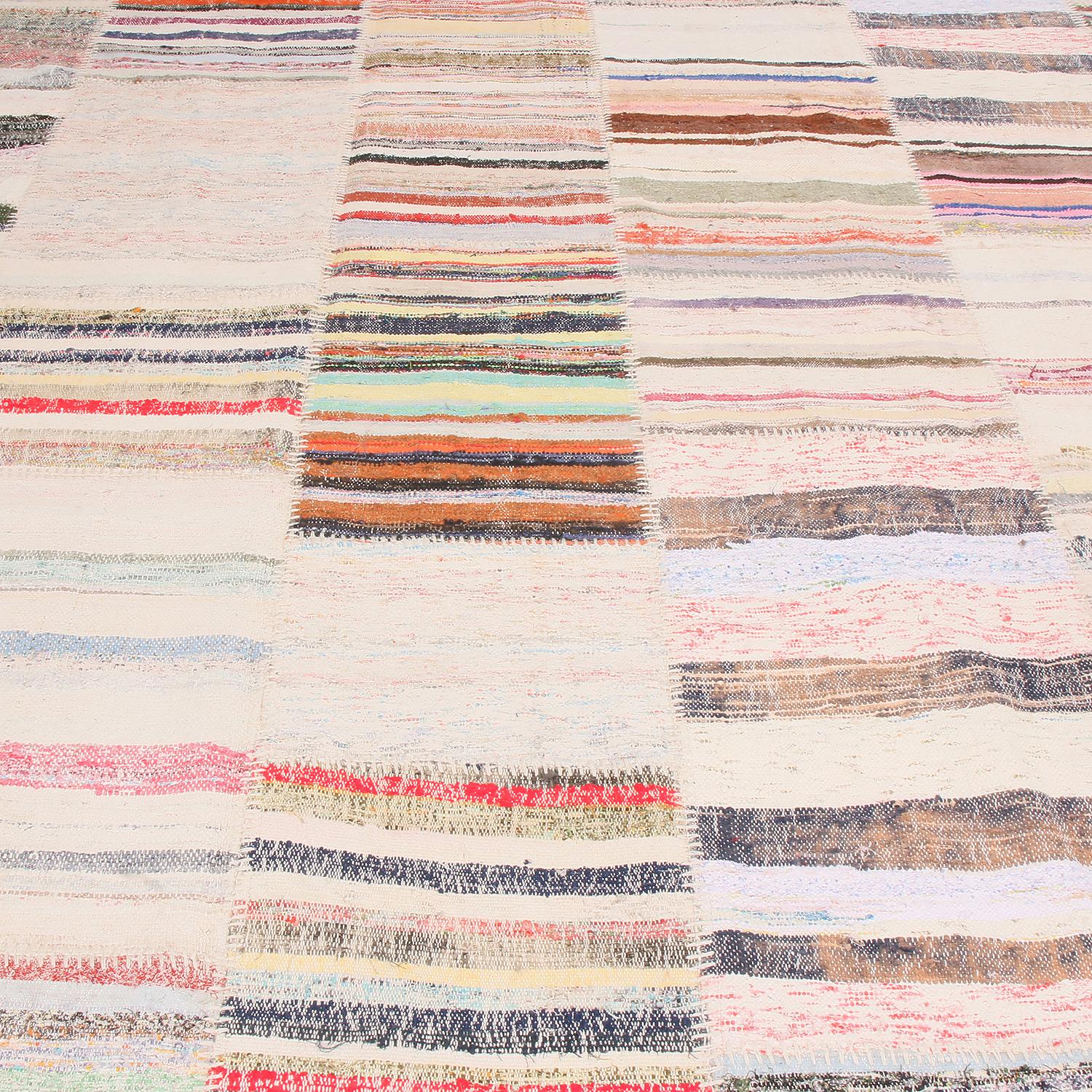 Handwoven in high-quality wool originating from Turkey, this new flat-woven geometric Kilim rug from Rug & Kilim’s patchwork collection is comprised of select pieces from vintage Kilim rugs with a brilliant spectrum of red, blue, pink, green, and