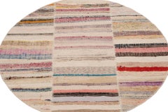 Rug & Kilim’s Patchwork Kilim Circle Rug in Polychromatic Stripes