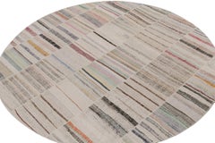 Rug & Kilim’s Patchwork Kilim Circle Rug in Polychromatic Stripes
