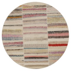 Rug & Kilim’s Patchwork Kilim Circle Rug in Polychromatic Stripes