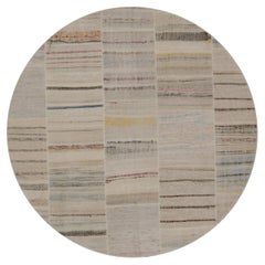 Alfombra circular Patchwork Kilim de rayas policromáticas de Rug & Kilim