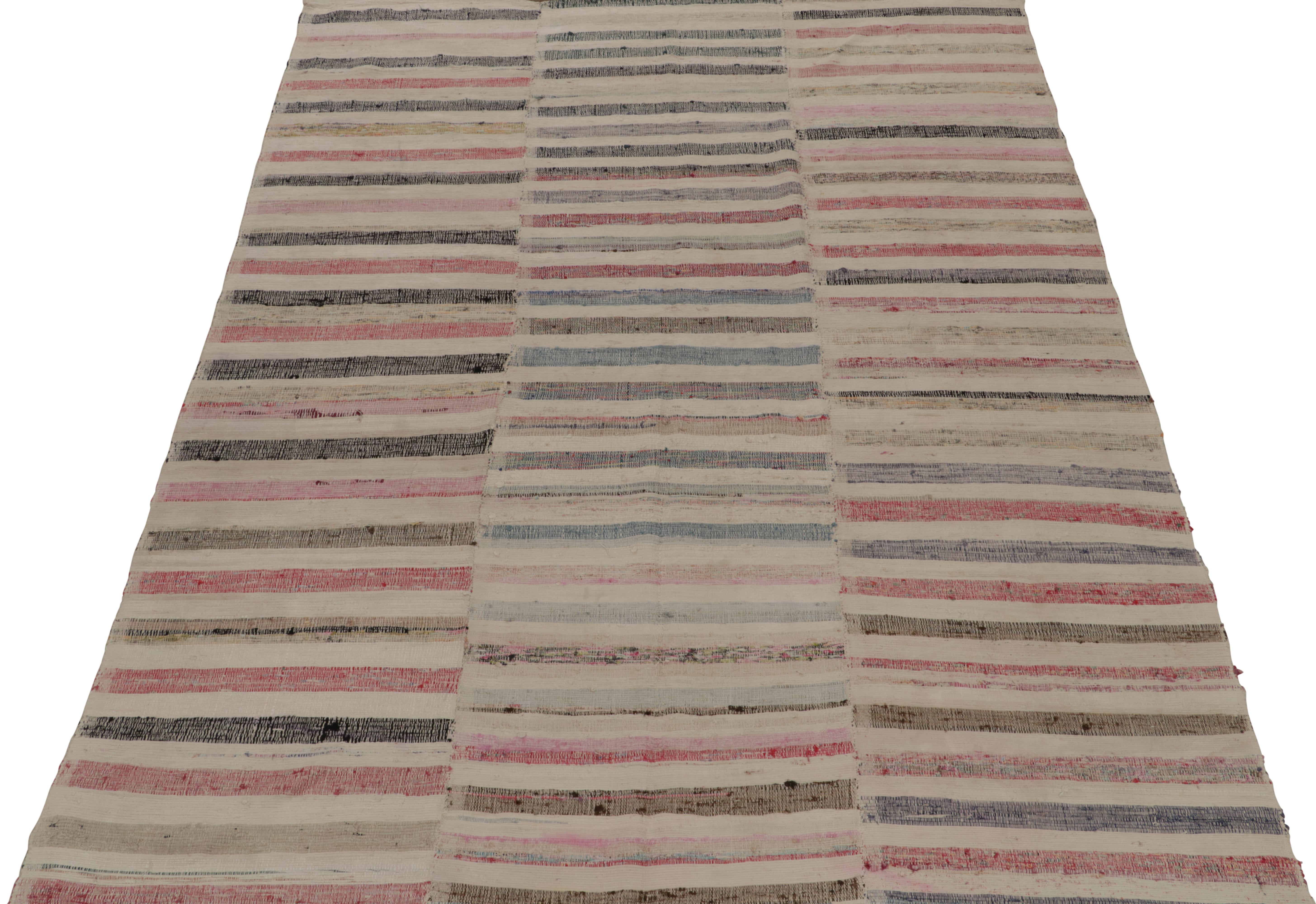 Handwoven in wool, Rug & Kilim presents a 7x10 contemporary rug from their innovative new patchwork kilim collection. 

On the Design: 

This flat weave technique repurposes vintage yarns in polychromatic stripes and striae, achieving a playful
