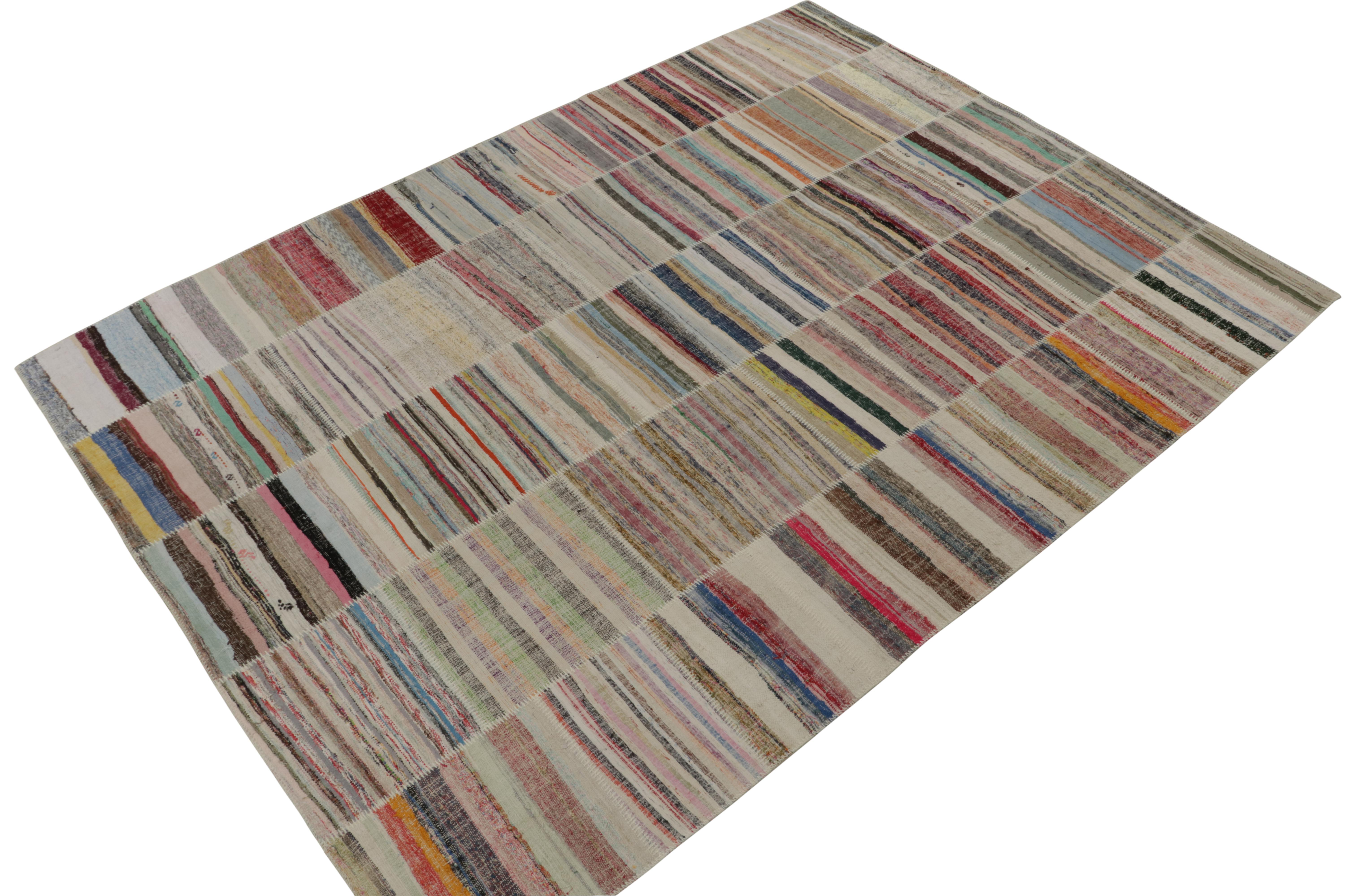 Handwoven in wool, Rug & Kilim presents a spacious 9x12 contemporary rug from their innovative new patchwork kilim collection. 

On the design: 

This flat weave technique repurposes vintage yarns in polychromatic stripes and striae, achieving a