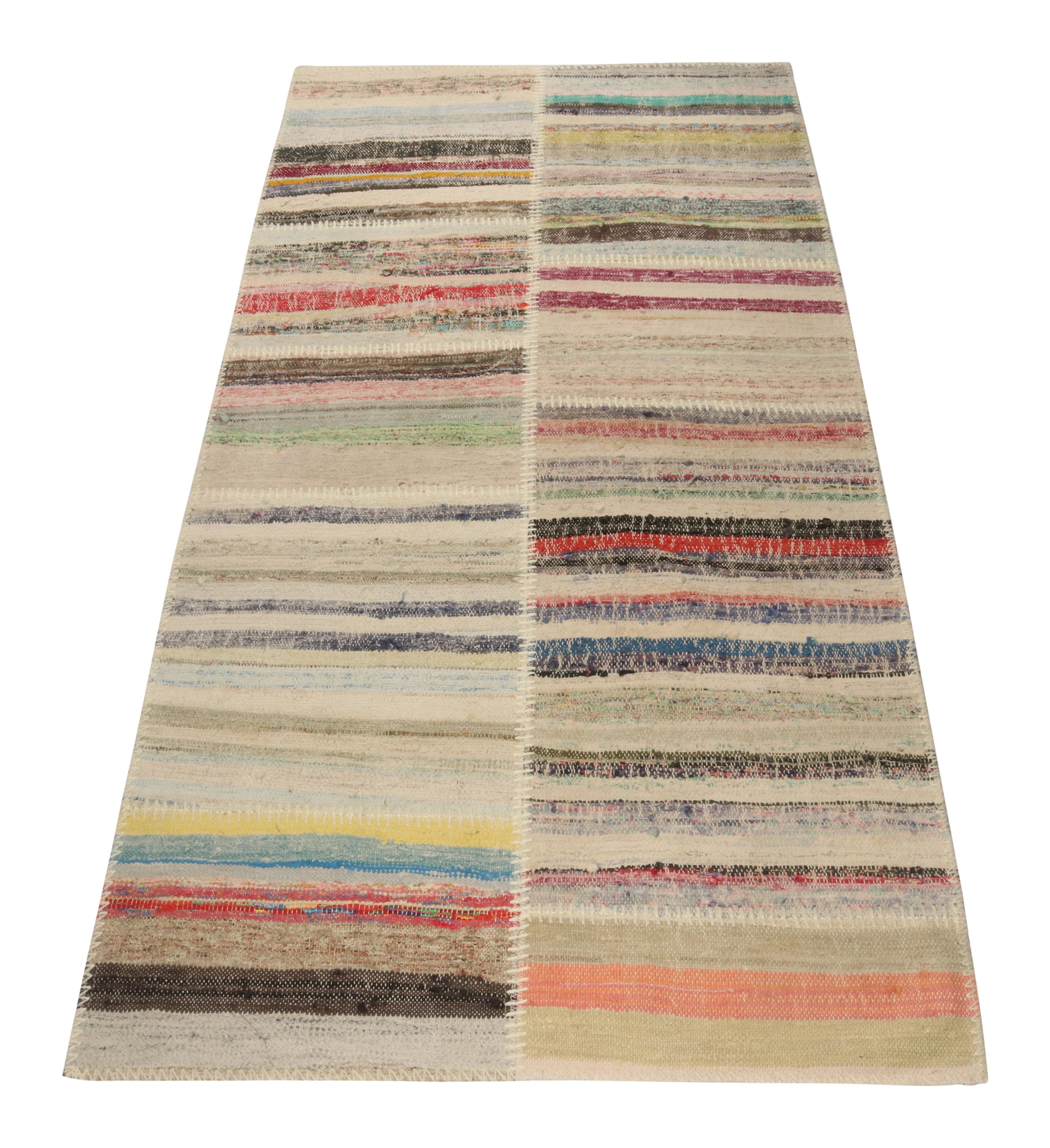 Handwoven in wool, Rug & Kilim presents a 3x6 contemporary runner from their innovative new patchwork kilim collection. 

On the Design: 

This flat weave technique repurposes vintage yarns in polychromatic stripes and striae, achieving a