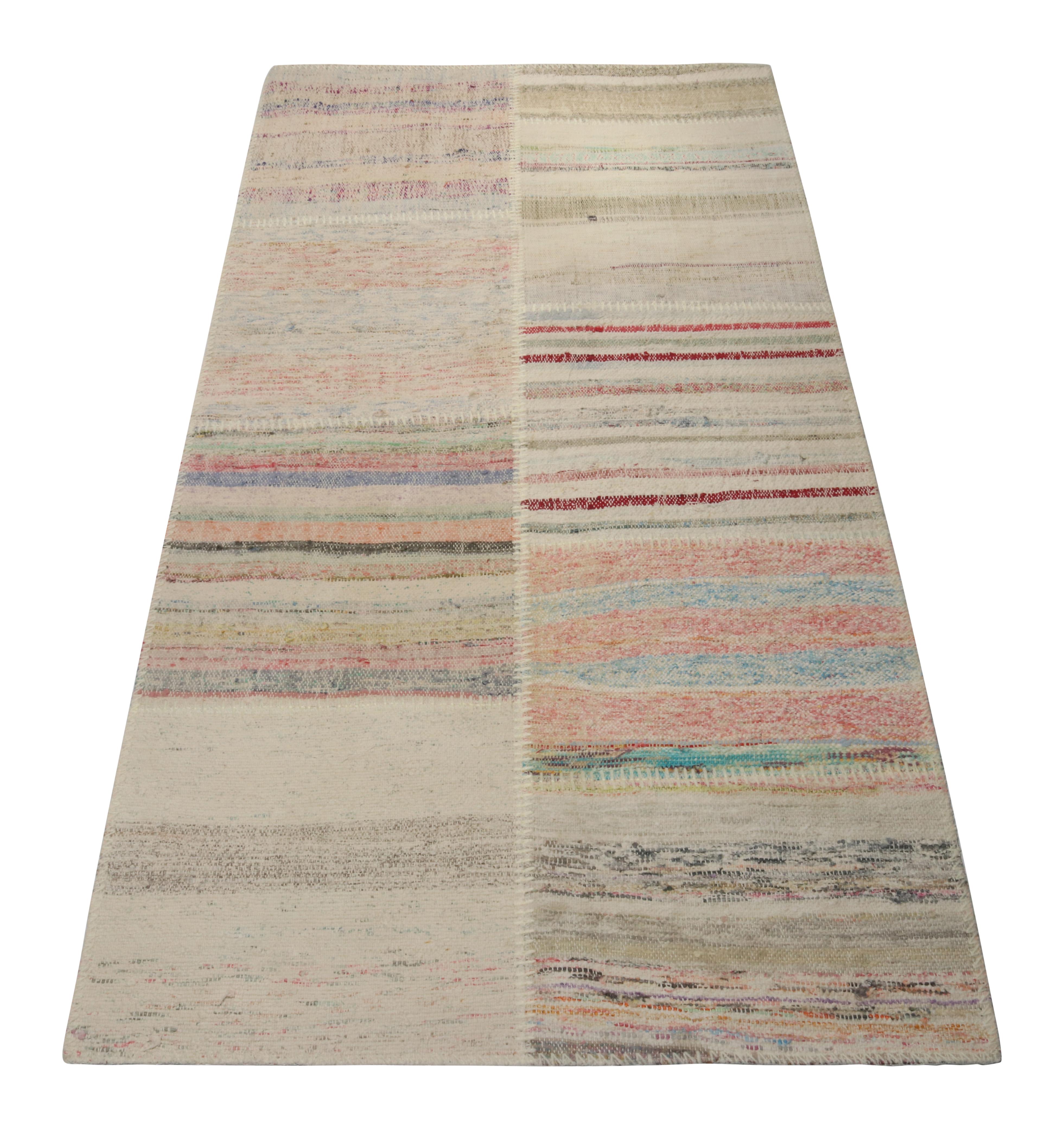 Handwoven in wool, Rug & Kilim presents a 3x6 contemporary runner from their innovative new patchwork kilim collection. 

On the Design: 

This flat weave technique repurposes vintage yarns in polychromatic stripes and striae, achieving a playful