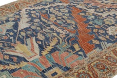 Rug & Kilim’s Persian Bakshaish Rug in Navy Blue with Floral Patterns