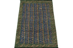 Rug & Kilim’s Persian Baluch Rug in Green with Stripes and Geometric Patterns