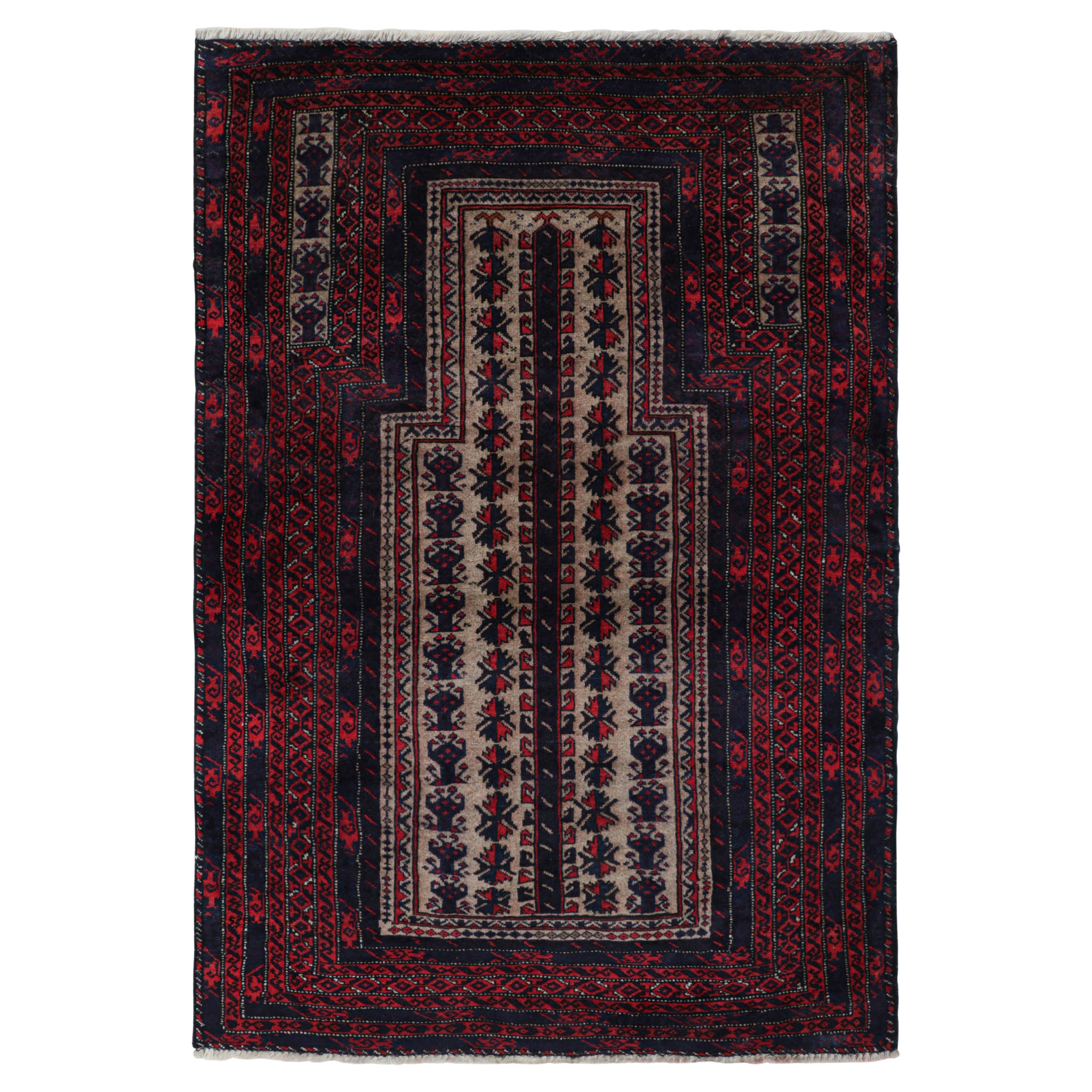 Rug & Kilim’s Persian Baluch Tribal Rug in Burgundy with Geometric Patterns
