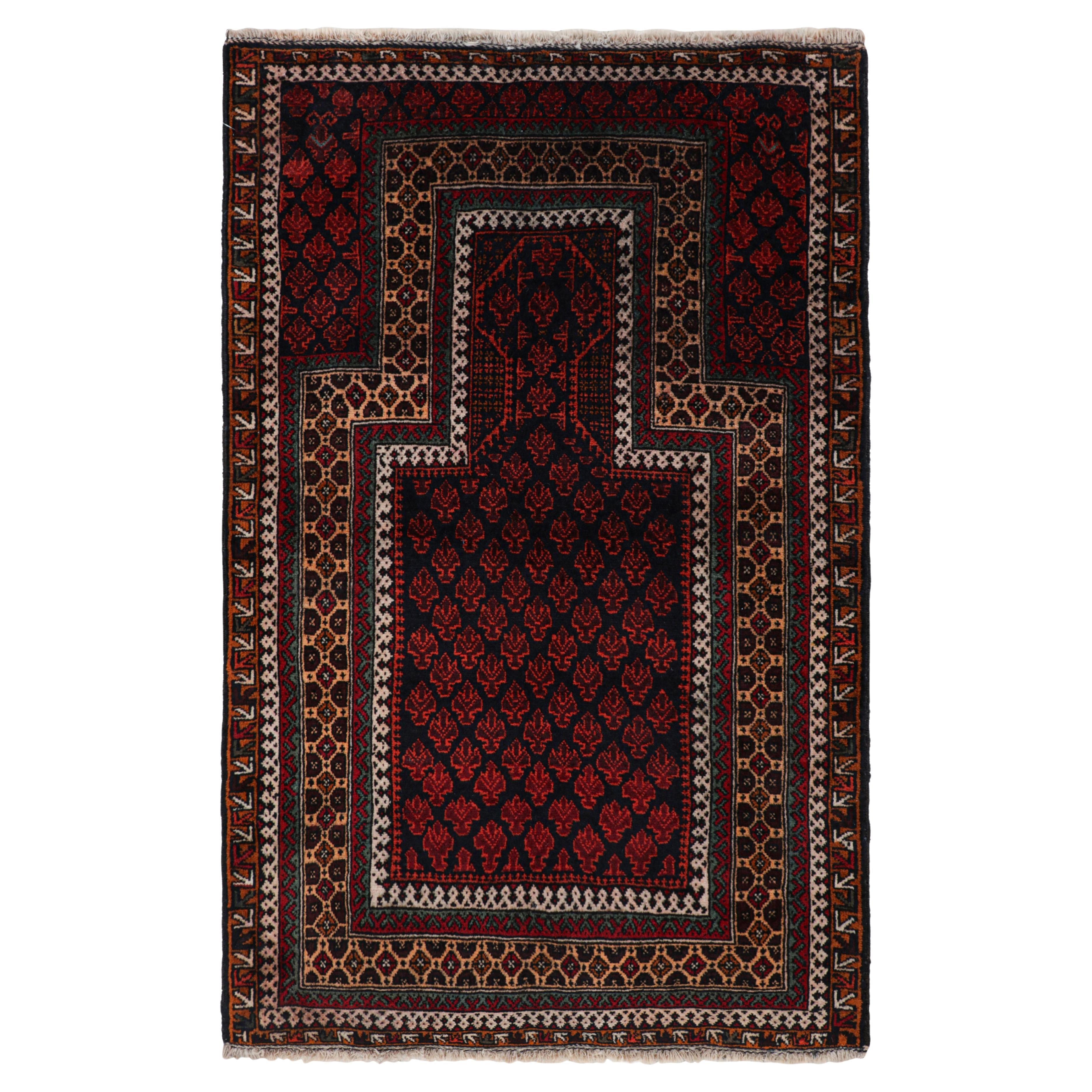 Alfombra Tribal Persa Baluch de Rug & Kilim en rojo con motivos geométricos