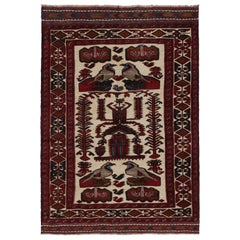 Rug & Kilim’s Persian Barjasta style rug in Beige & Red with Bird Pictorials