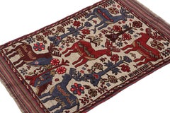 Rug & Kilim’s Persian Barjasta style rug in Beige with Red & Blue Deer Pictorial
