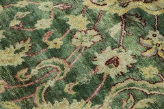 Rug & Kilim’s Persian-Inspired Rug in Rich Green with Gold Floral Motifs