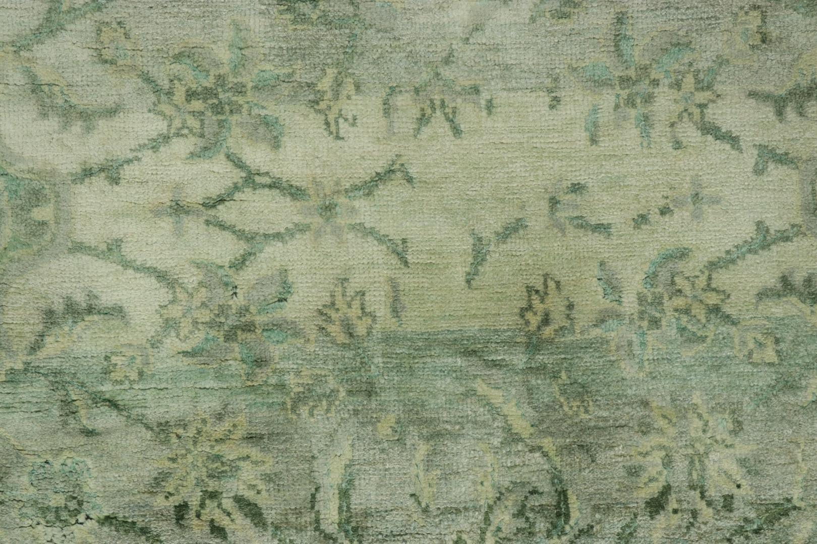 Made with a luxurious hand-knotted silk, this 4x5 modern rug is a bold addition to Rug & Kilim’s Modern Classics Collection—an unexpected, yet luxurious reimagining of historic designs, like this piece’s homage to vintage and antique Persian rugs in