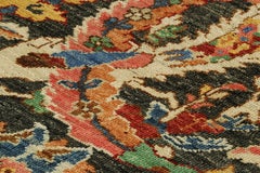 Rug & Kilim’s Persian Kerman Style Rug in Black with Colorful Floral Patterns
