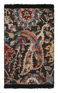 Rug & Kilim's Persian Kerman Style Rug in Black with Vibrant Floral Patterns (tapis persan de style Kerman en noir avec des motifs floraux vibrants) 