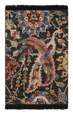 Rug & Kilim’s Persian Kerman Style Rug in Black with Vibrant Floral Patterns 