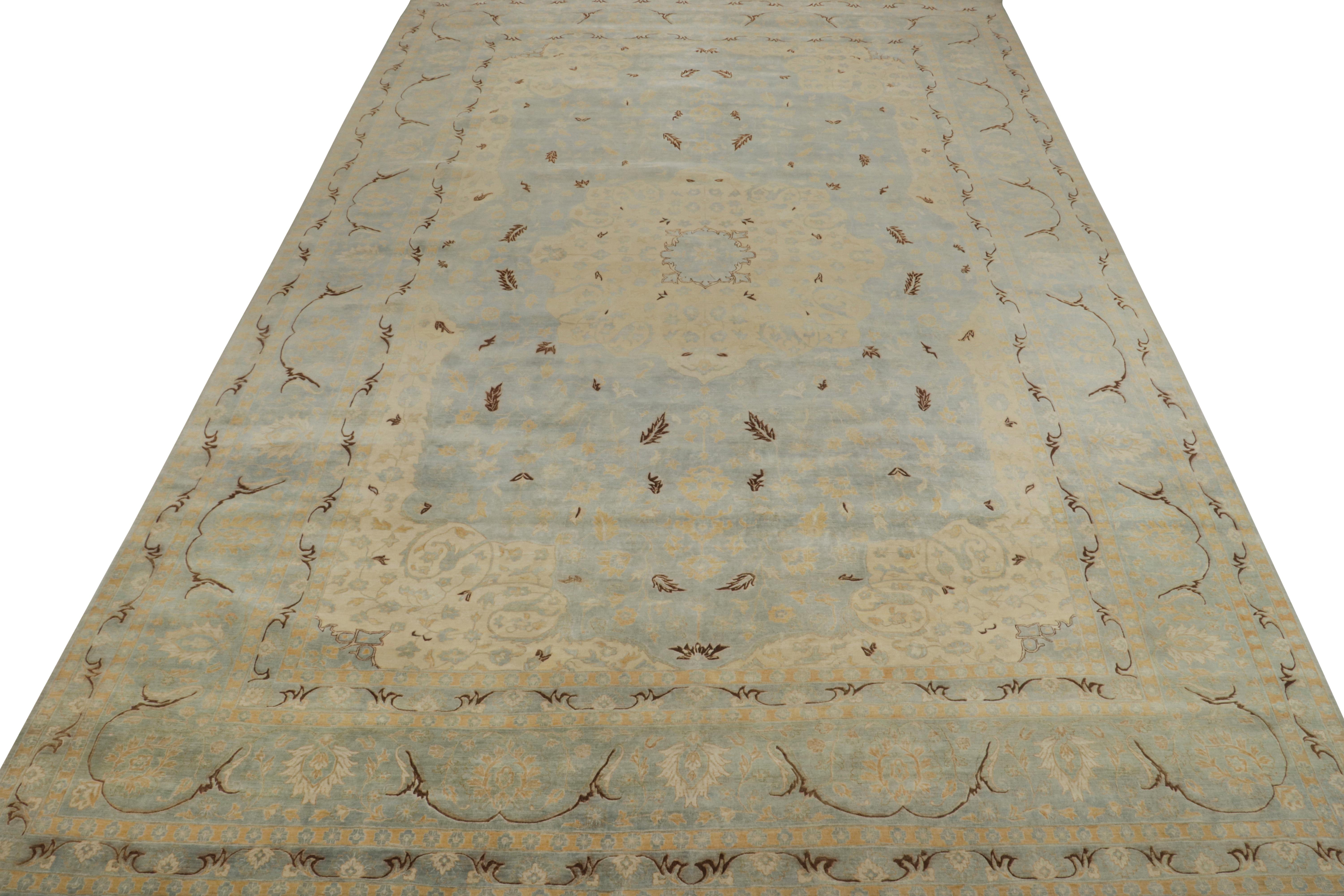 This 12x18 hand-knotted wool rug from our Modern Classics collection enjoys an inventive reimagining of antique Tabriz Persian rugs. 

The drawing depicts the celebrated Herati pattern, recaptured in the most alluring play of blue, beige, gold,