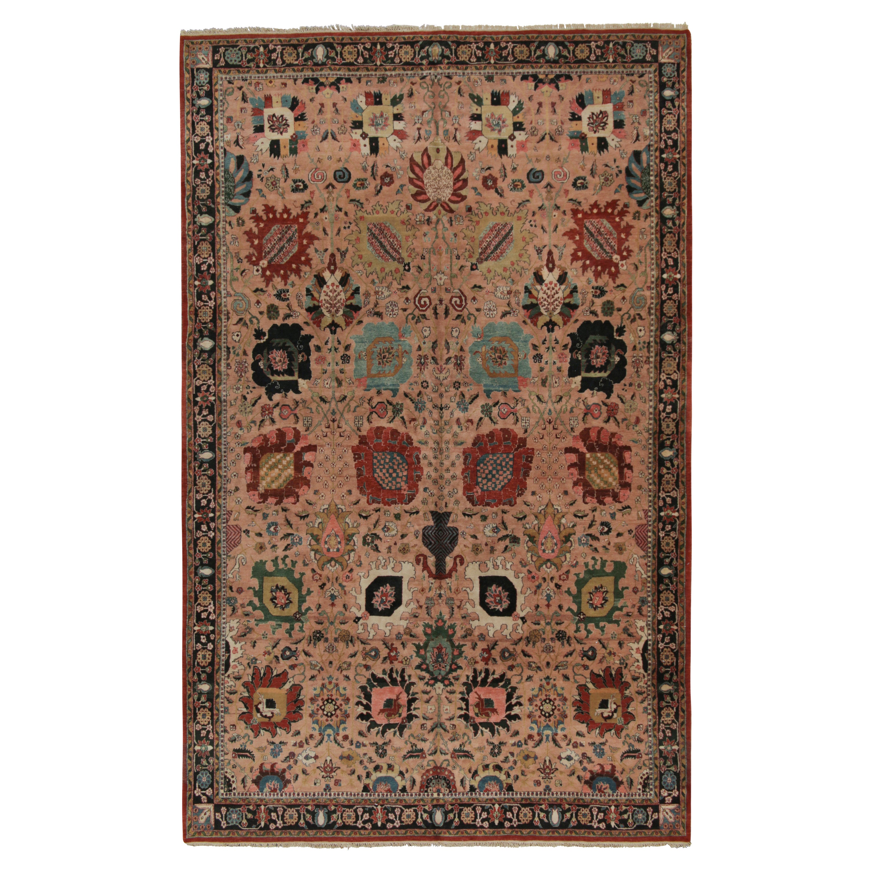 Tapis de style persan rose à motifs floraux polychromes de Rug & Kilim
