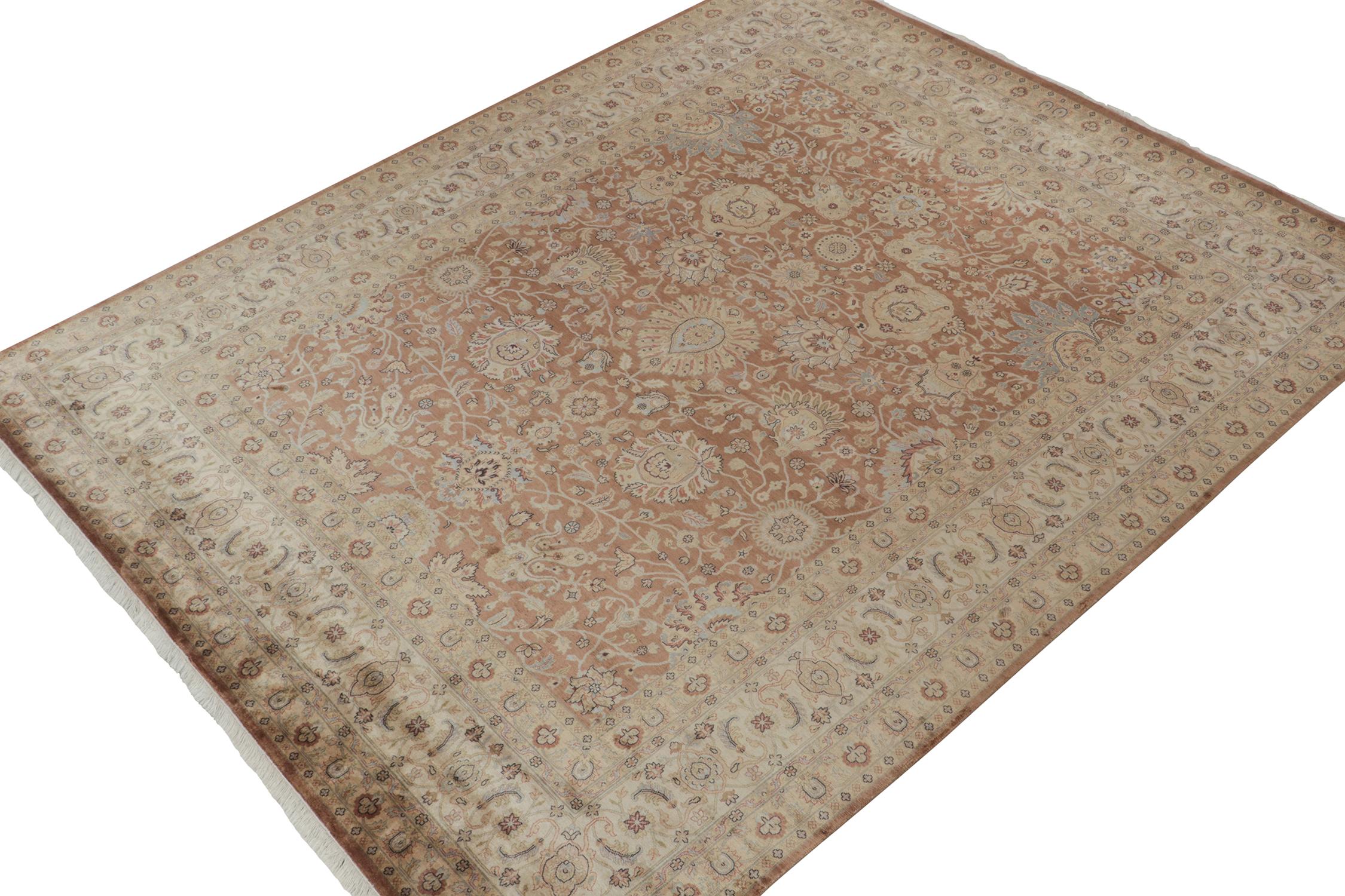 An 8x10 rug inspired by celebrated Tabriz styles, from Rug & Kilim’s Modern Classics Collection. Hand knotted in wool, playing an exceptional rust with beige-brown with blue floral patterns in classic grace and movement.
Further On the Design:
The