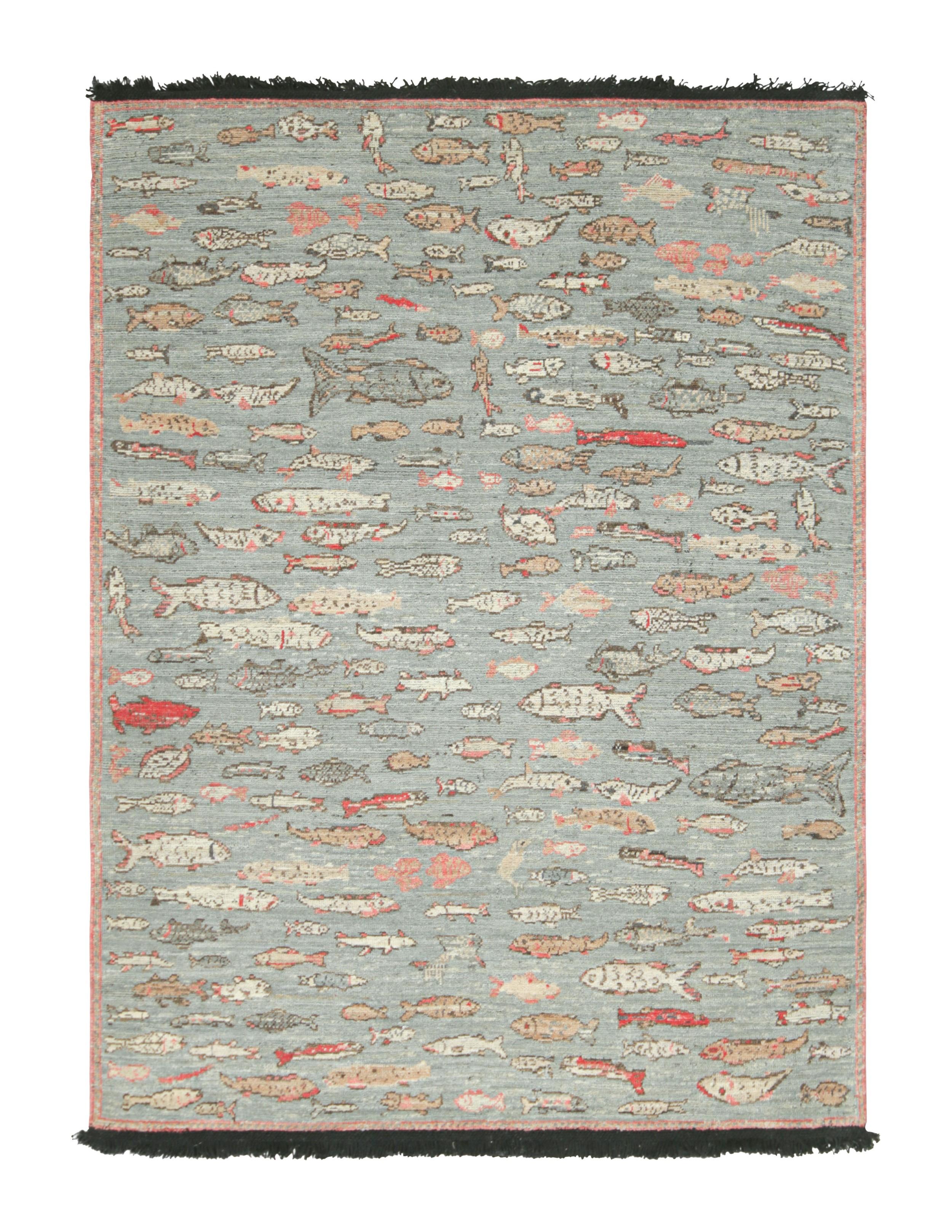Made with hand-knotted Ghazni wool, this 5x7 rug from Rug & Kilim’s Burano collection features schools of stylized fish pictorial patterns across a celadon ground. 

On the Design: 

This contemporary design features an arrangement of marine life,