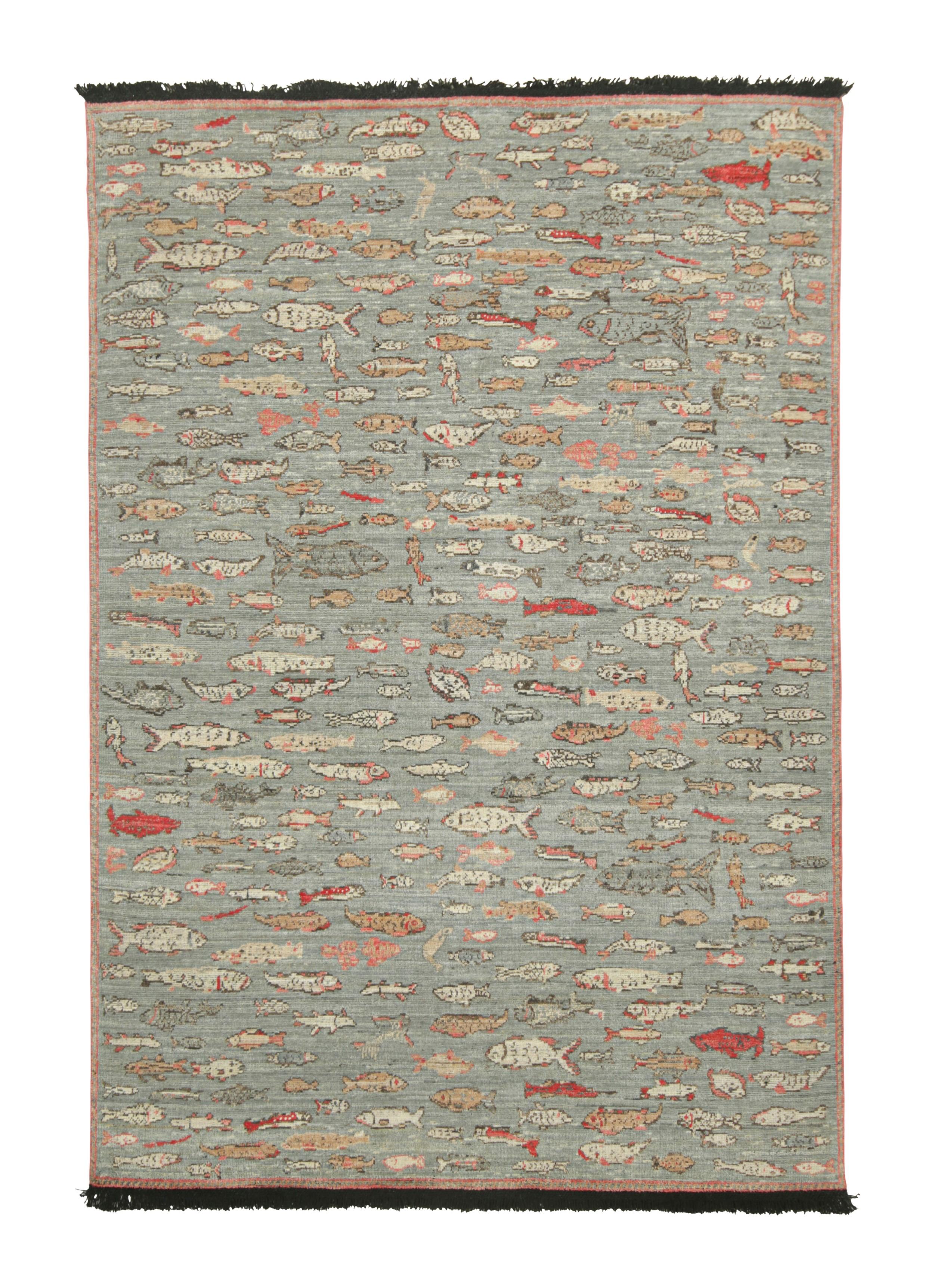 Made with hand-knotted Ghazni wool, this 6x9 rug from Rug & Kilim’s Burano collection features schools of stylized fish pictorial patterns across a celadon ground. 

On the Design: 

This contemporary design features an arrangement of marine life,