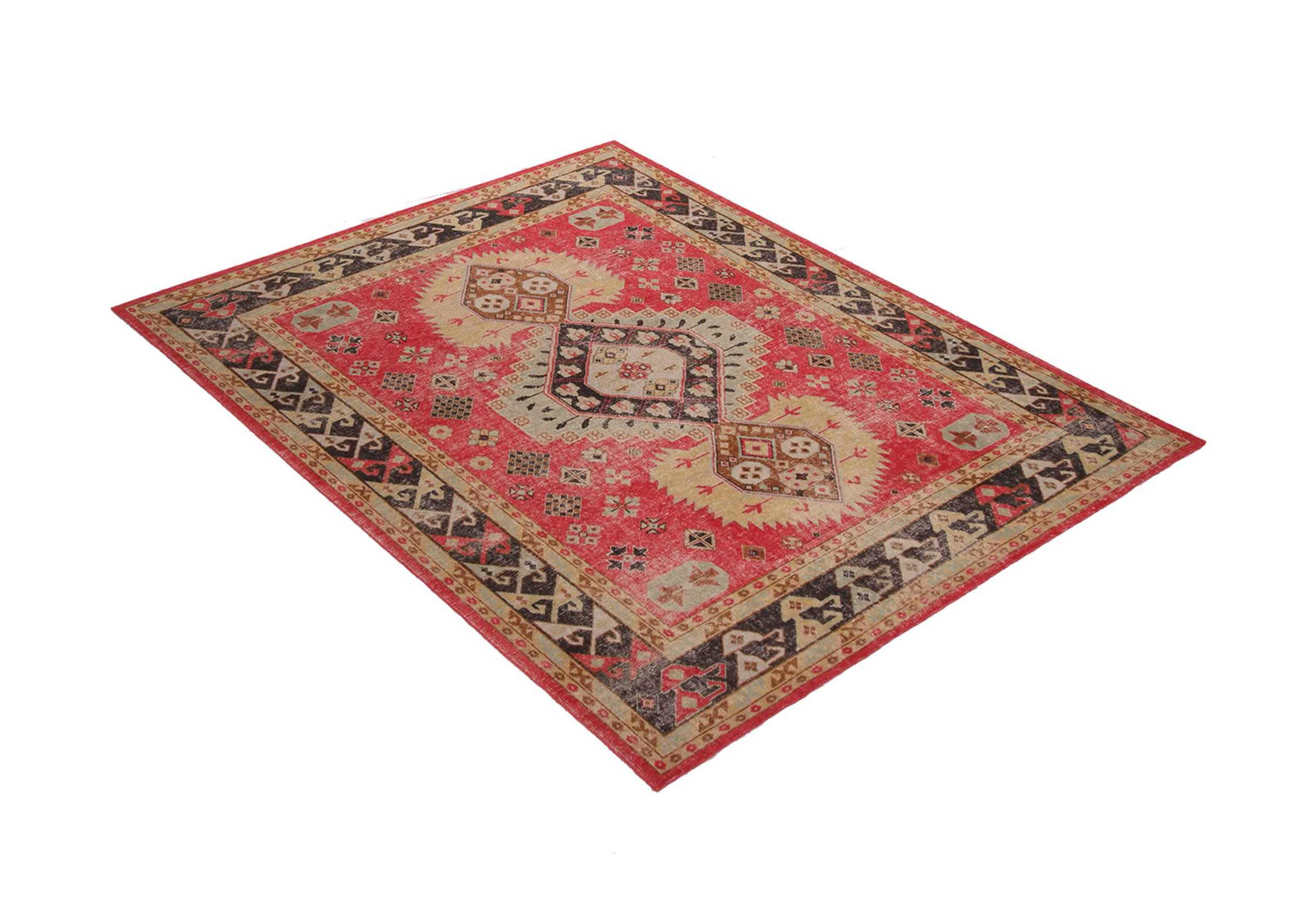 This contemporary hand knotted wool rug hails from Rug & Kilim’s Homage Collection and enjoys a finer take on distressed shabby chic aesthetic with fewer knots per square inch. The fiery red background plays off the bright gold accents of the