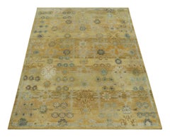 Rug & Kilim’s Samarkand-Inspired Rug, Gold with Ice Blue Floral Patterns