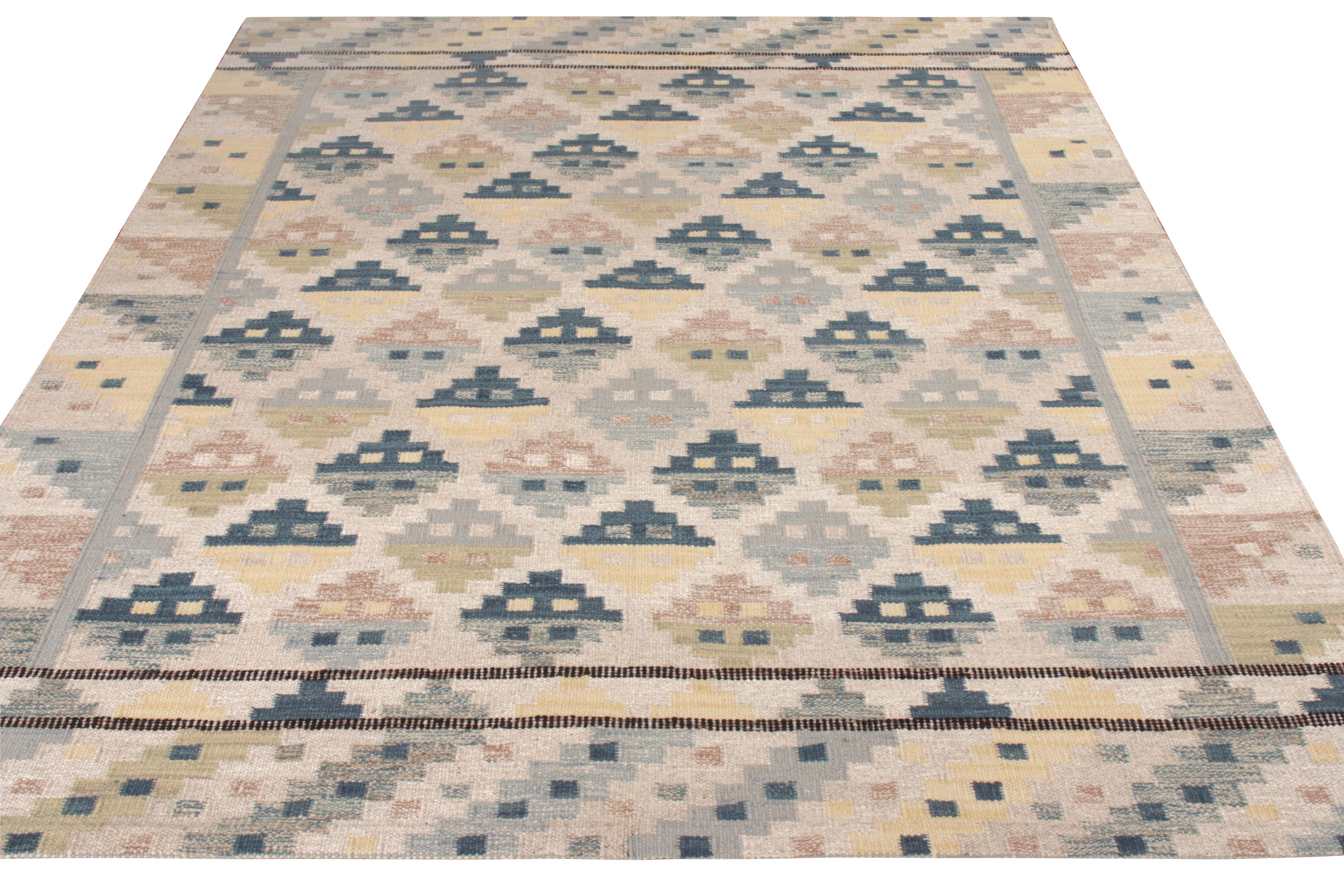 Handwoven in wool and undyed natural yarns, this 8x10 Kilim rug is an enthralling new addition to Rug & Kilim’s celebrated Scandinavian Kilim Collection. The beauty of the rug lies in its elaborate geometric pattern enclosed in a mature blue and