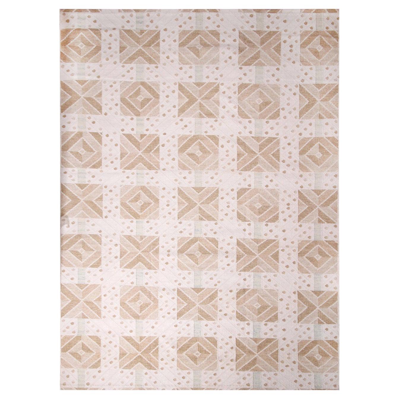 Alfombra de lana natural de inspiración escandinava en color crema y beige-marrón de Rug & Kilim