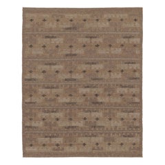 Rug & Kilim’s Scandinavian-Inspired Custom Rug in Earthy Brown and Beige Tones
