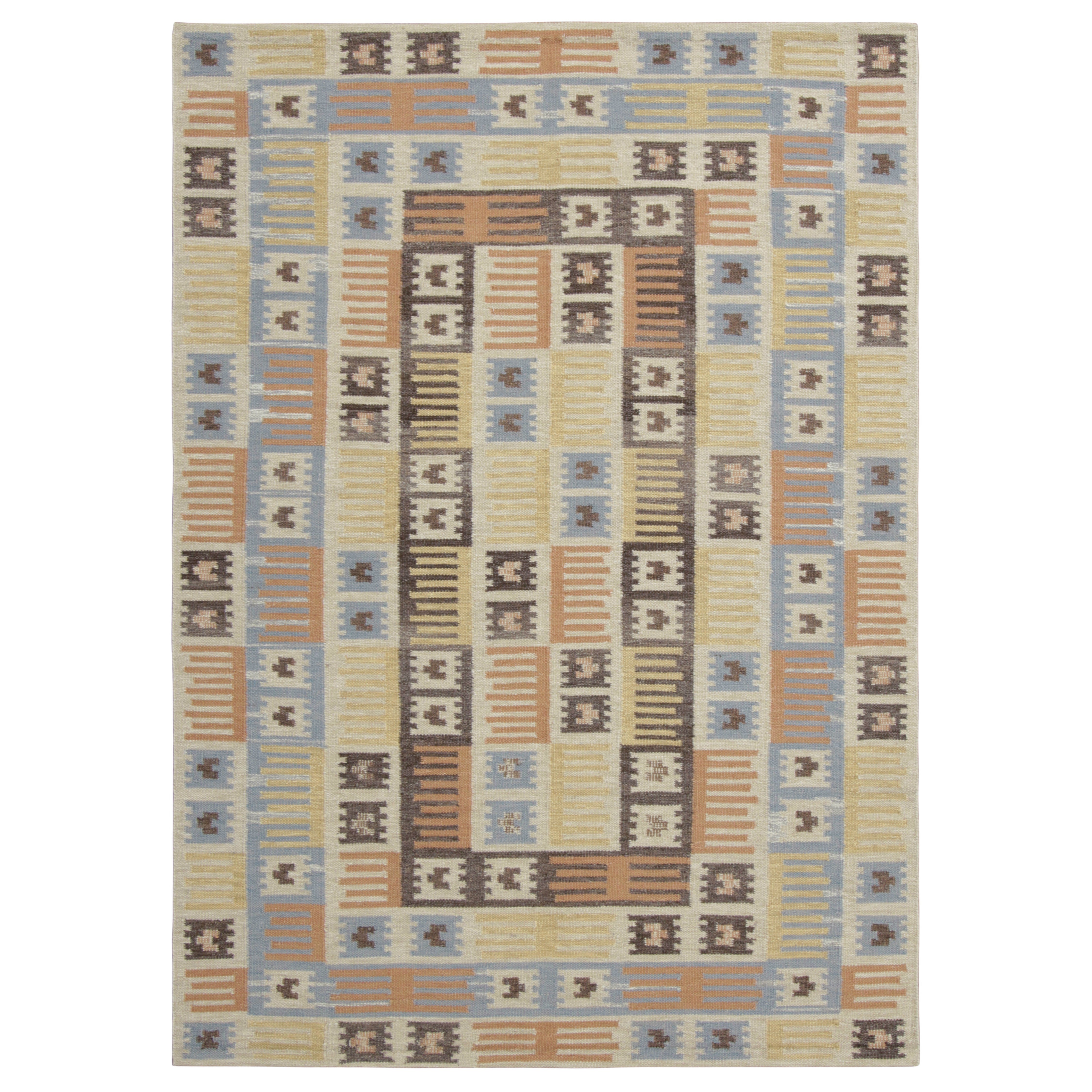 Rug & Kilim’s Scandinavian-Inspired Custom Rug with Colorful Geometric Patterns